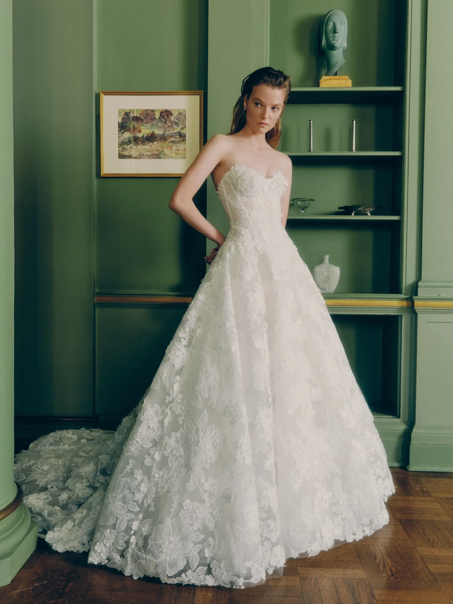 Model wearing a gown by Rita Vinieris